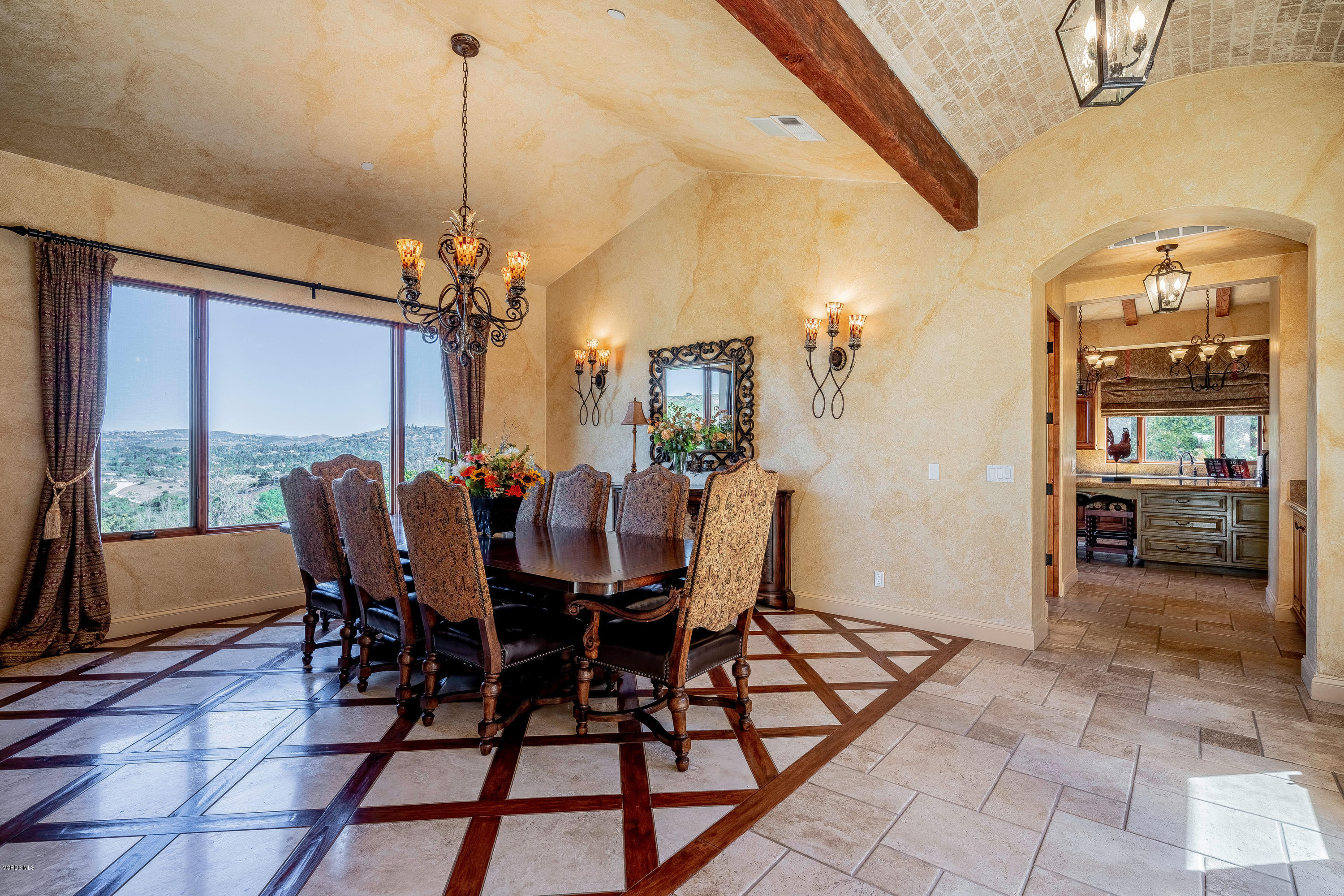 525 Rimrock Road Thousand Oaks, CA 91361 - Photo 15 of 95 a view of a dining room with furniture and chandelier