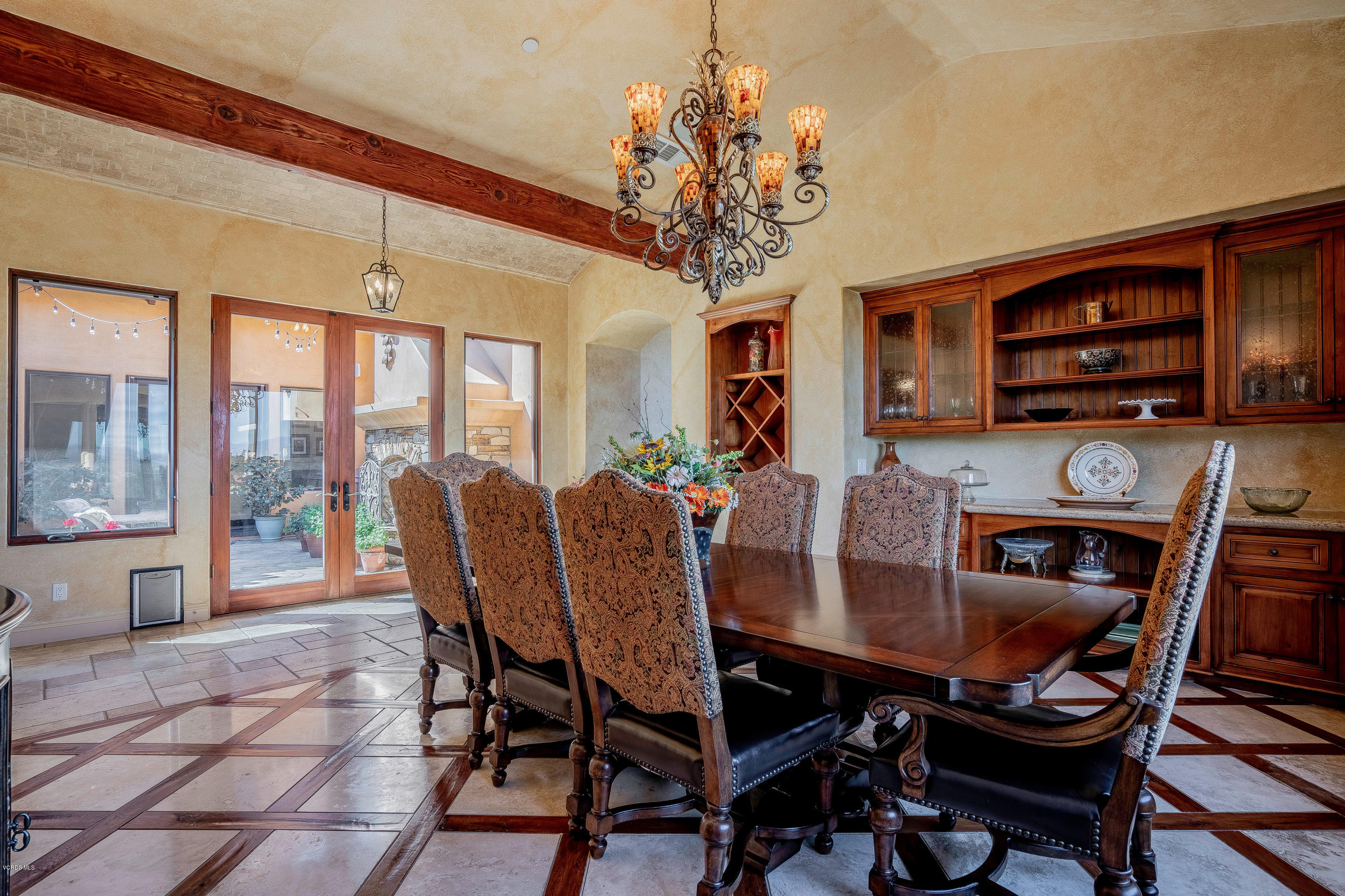 525 Rimrock Road Thousand Oaks, CA 91361 - Photo 18 of 95 a view of a dining room with furniture a chandelier and wooden floor