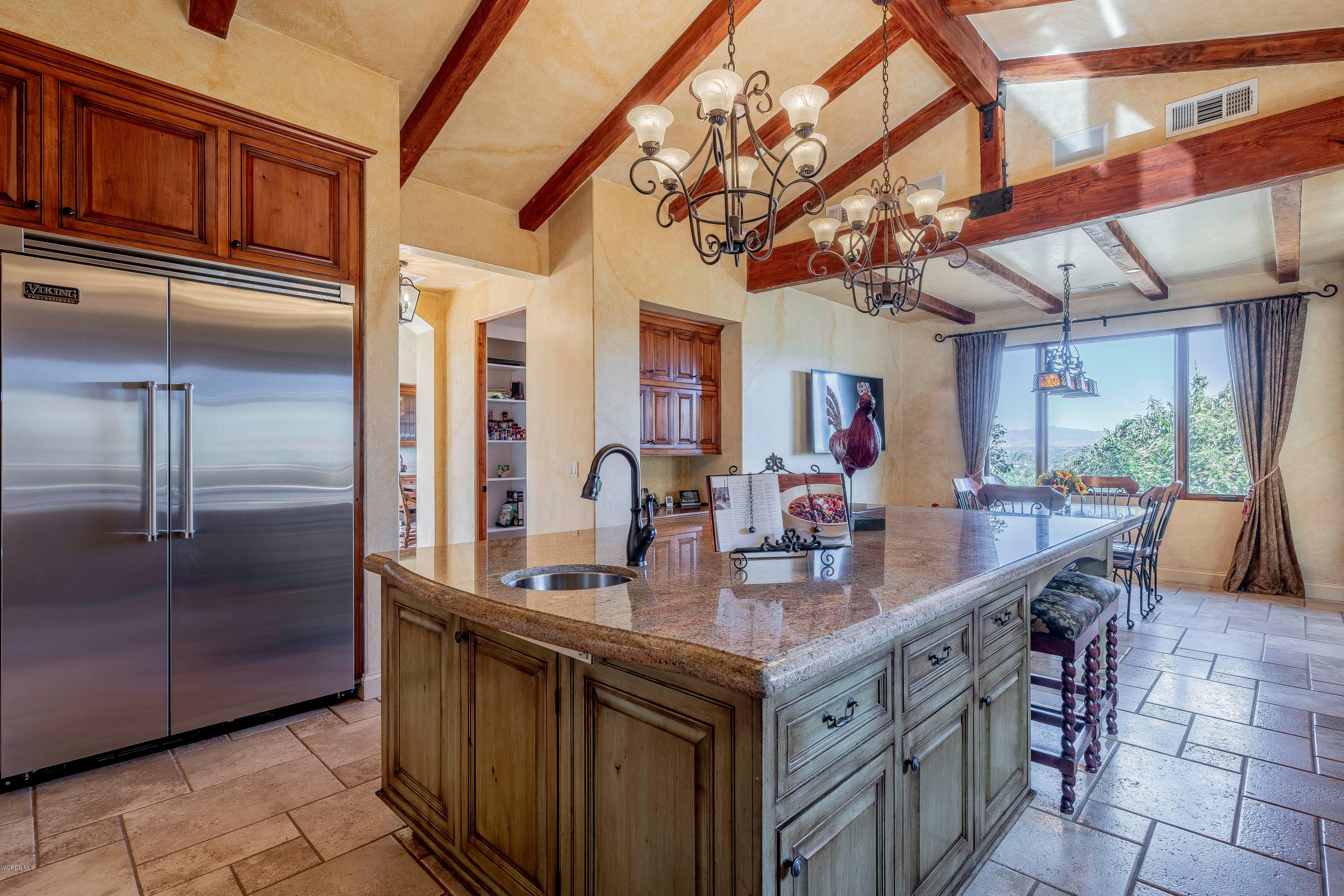 525 Rimrock Road Thousand Oaks, CA 91361 - Photo 20 of 95 a kitchen with stainless steel appliances granite countertop a sink a counter space and stainless steel appliances