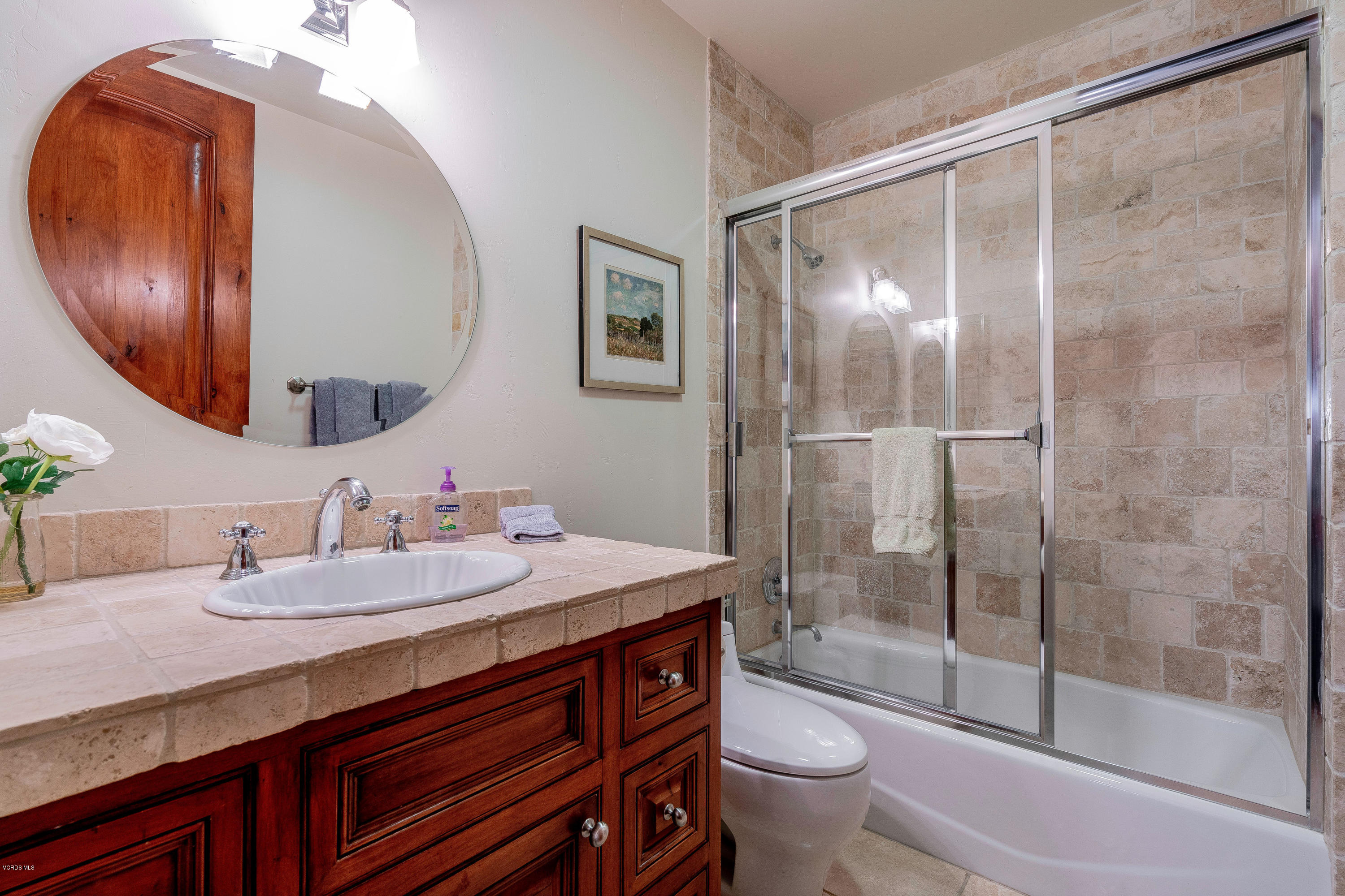 525 Rimrock Road Thousand Oaks, CA 91361 - Photo 25 of 95 a bathroom with a sink a toilet and shower