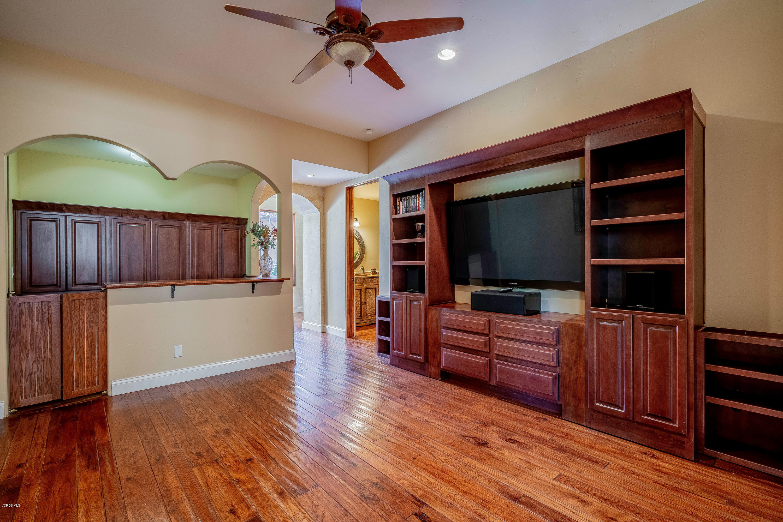 525 Rimrock Road Thousand Oaks, CA 91361 - Photo 29 of 95 a living room with furniture and a flat screen tv