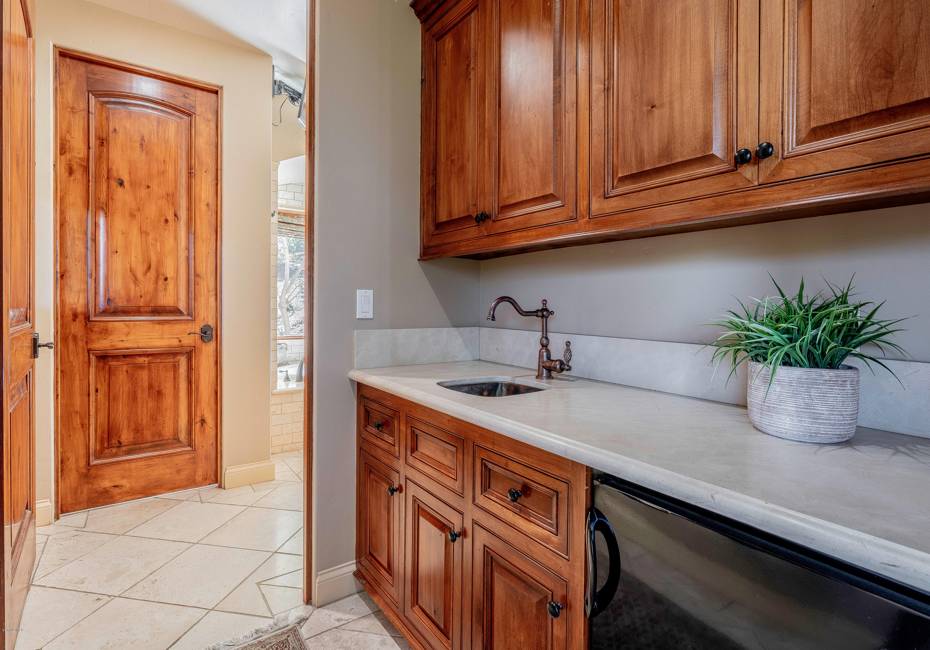 525 Rimrock Road Thousand Oaks, CA 91361 - Photo 37 of 95 a kitchen with stainless steel appliances granite countertop a sink a stove and cabinets