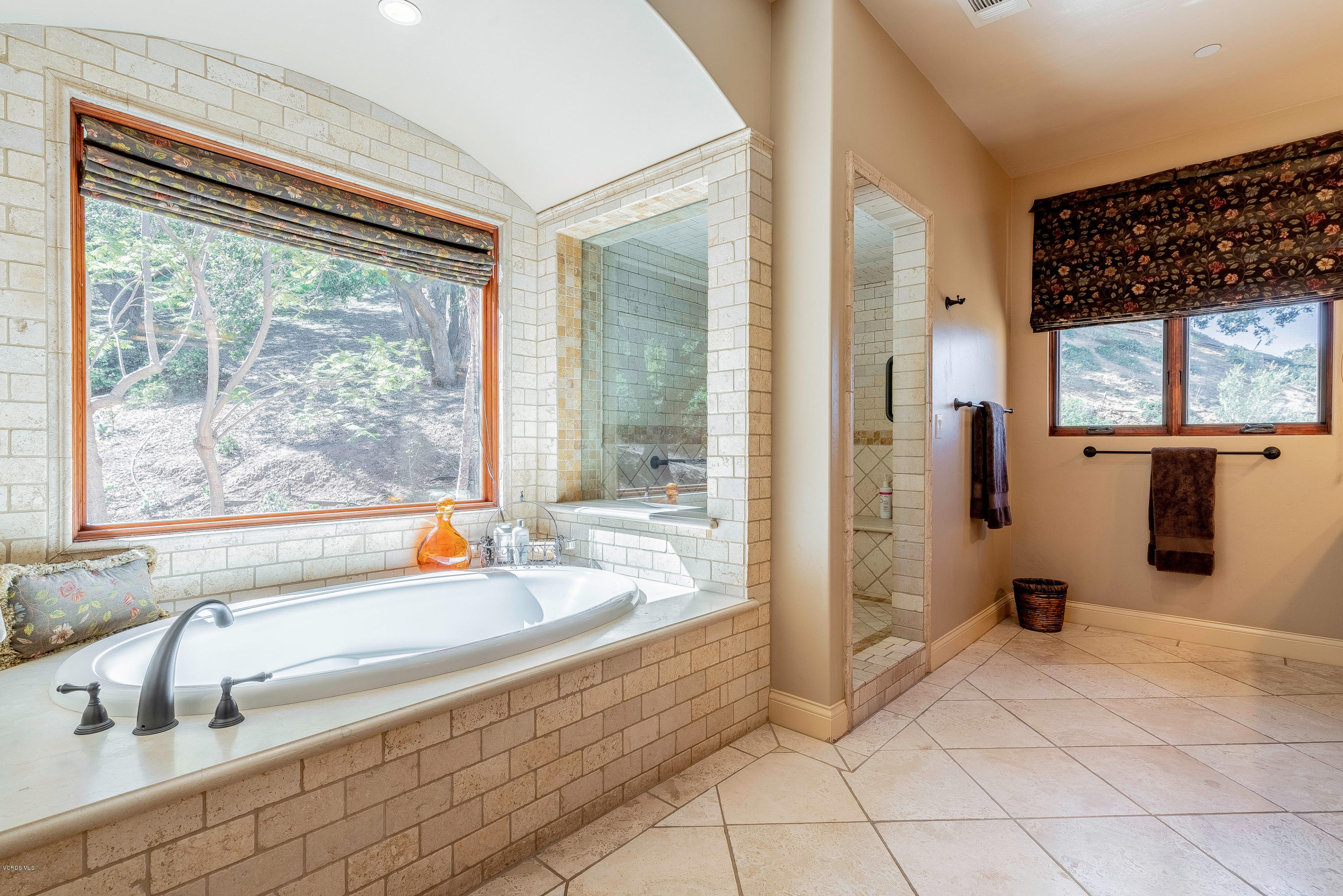 525 Rimrock Road Thousand Oaks, CA 91361 - Photo 38 of 95 a spacious bathroom with a tub and shower