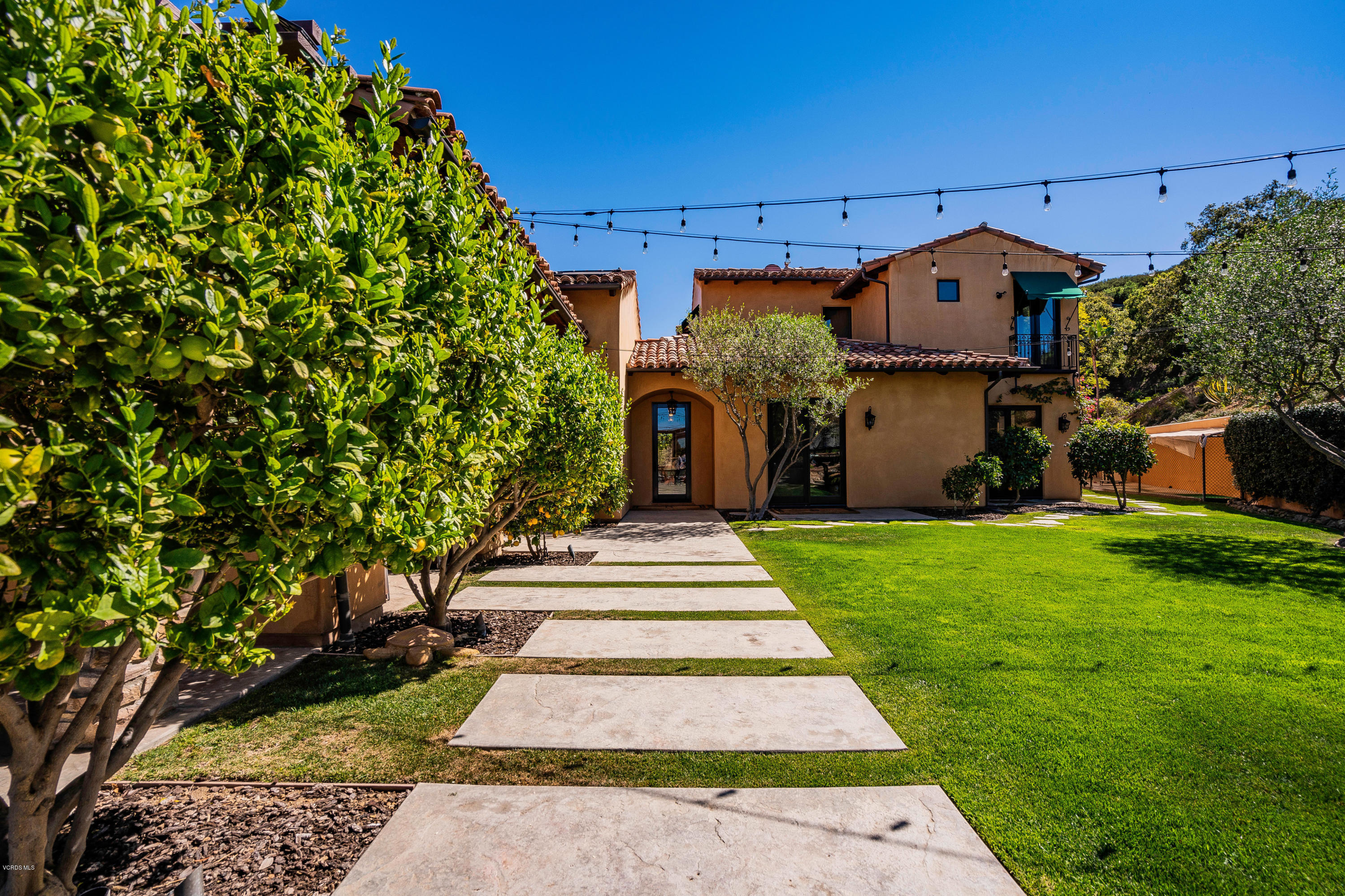 525 Rimrock Road Thousand Oaks, CA 91361 - Photo 57 of 95 a front view of a house with a yard