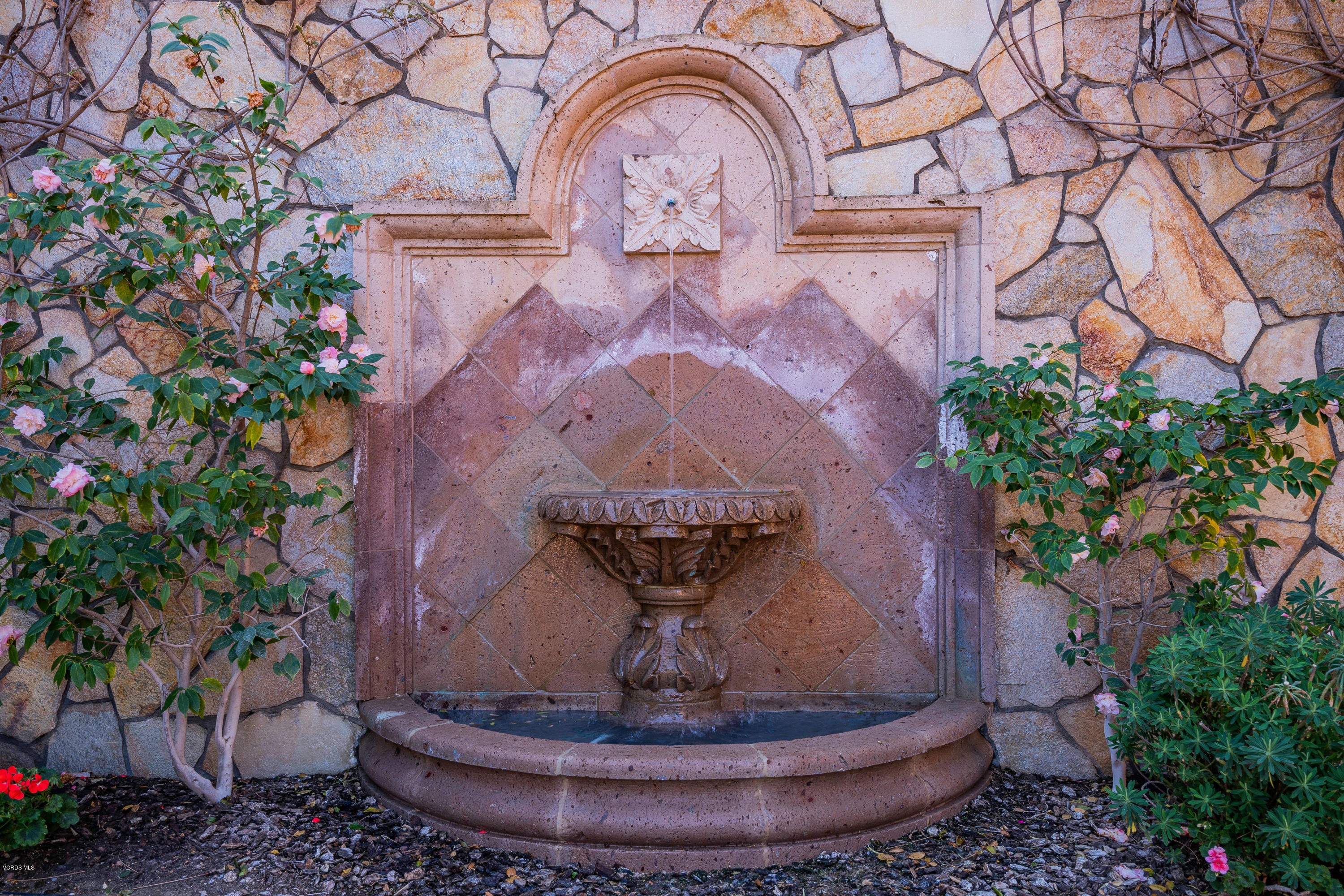 525 Rimrock Road Thousand Oaks, CA 91361 - Photo 66 of 95 a vase of flowers sitting on a table