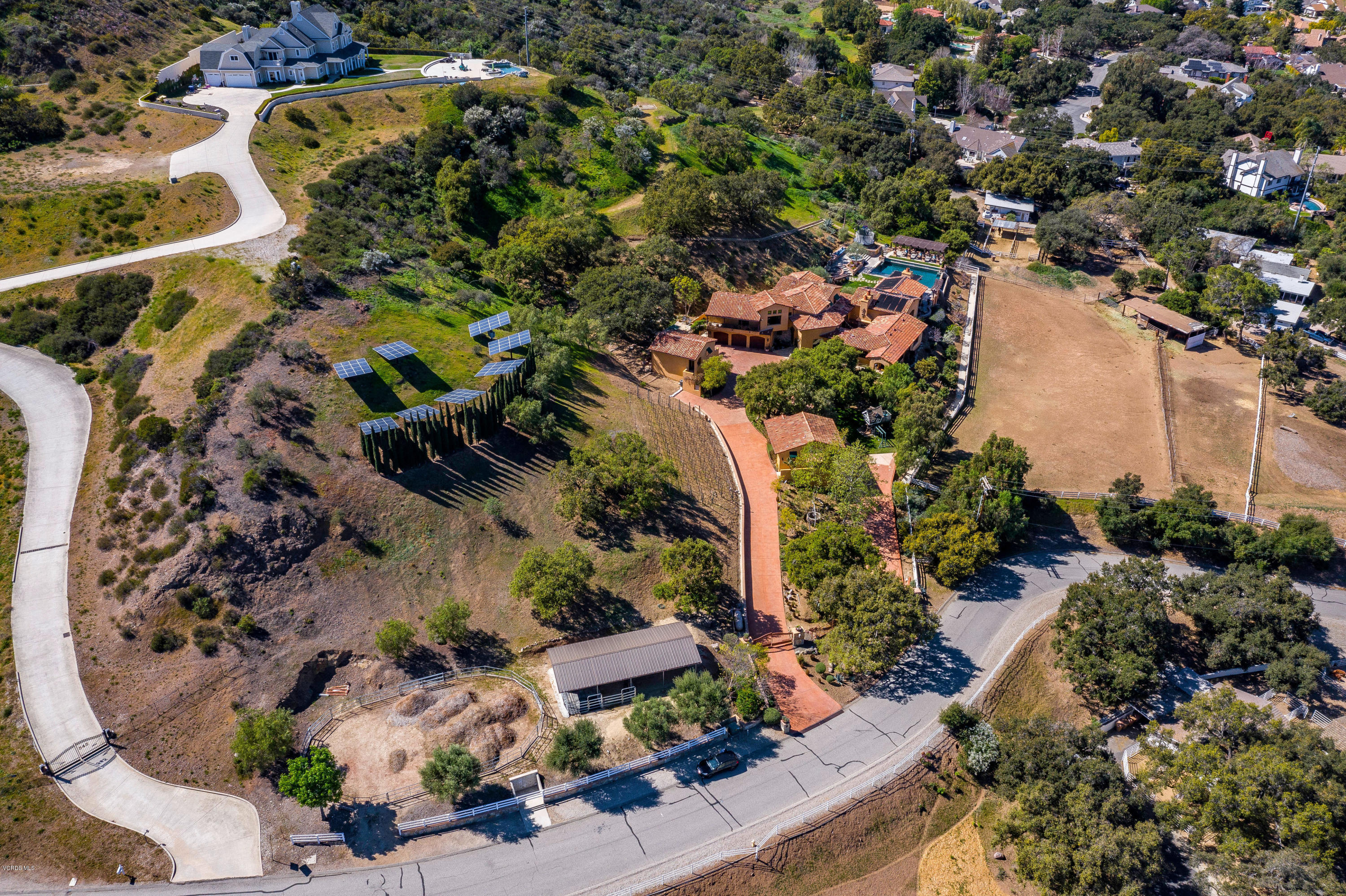 525 Rimrock Road Thousand Oaks, CA 91361 - Photo 86 of 95 an aerial view of a house with a yard and lake view