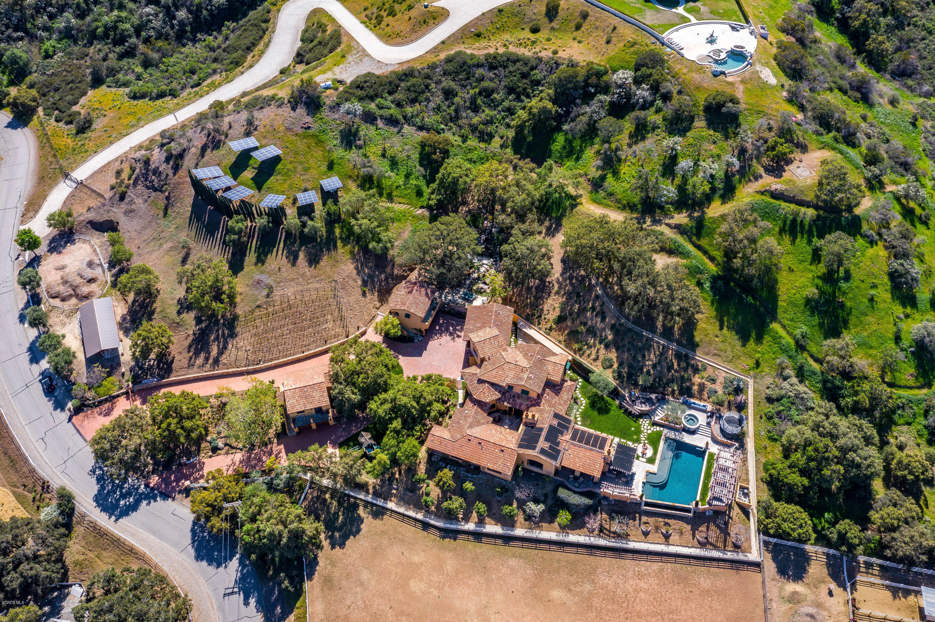 525 Rimrock Road Thousand Oaks, CA 91361 - Photo 88 of 95 an aerial view of a house with a yard and garden