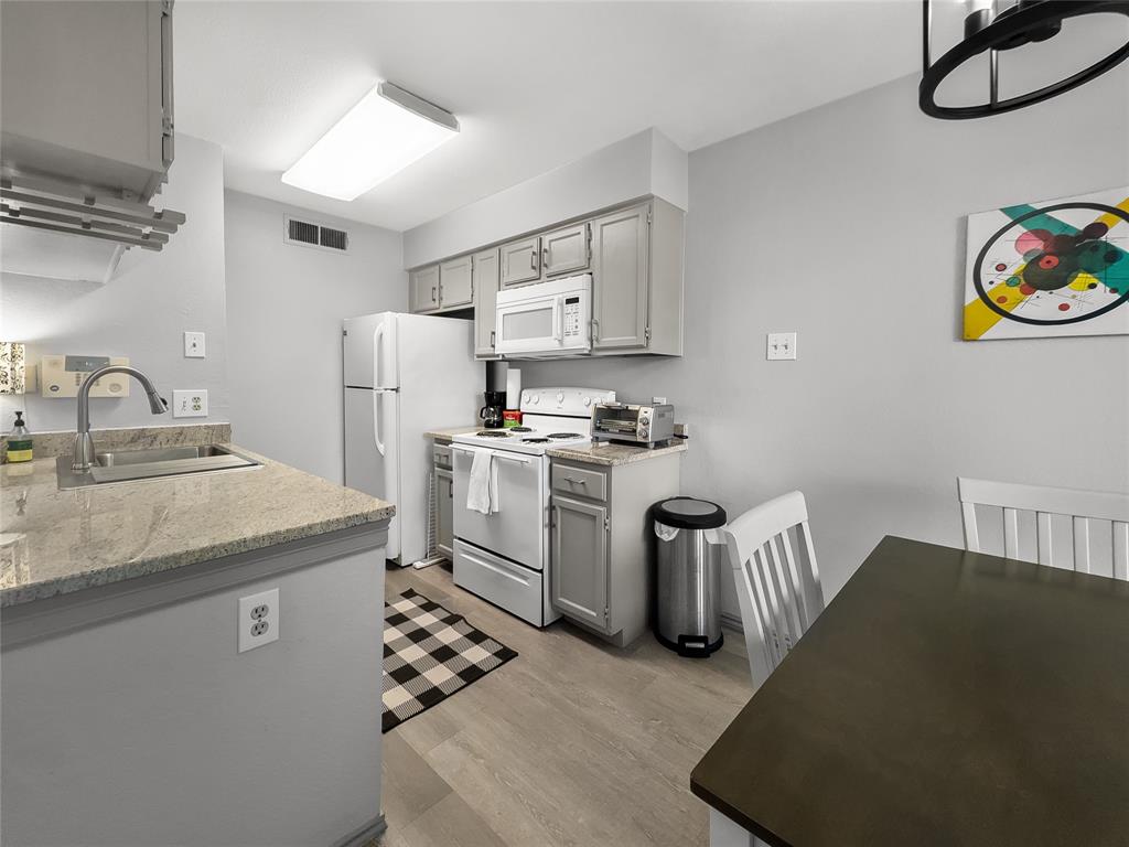 5750 Phoenix Drive, Unit 22 Dallas, TX 75231 - Photo 14 of 30 Kitchen Furnished
