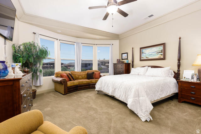 2005 West 450 S Circle St. George, UT 84770 - Photo 19 of 57 Expansive room featuring a curved bay window, neutral carpet flooring, and a ceiling fan with integrated lighting