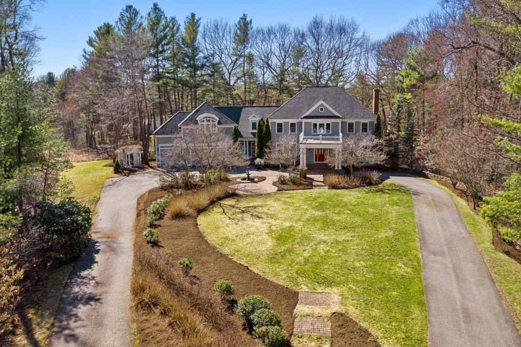 28 Cutler Farm Road Sudbury, MA 01776 - Photo 1 of 42 a view of swimming pool with a house in the background