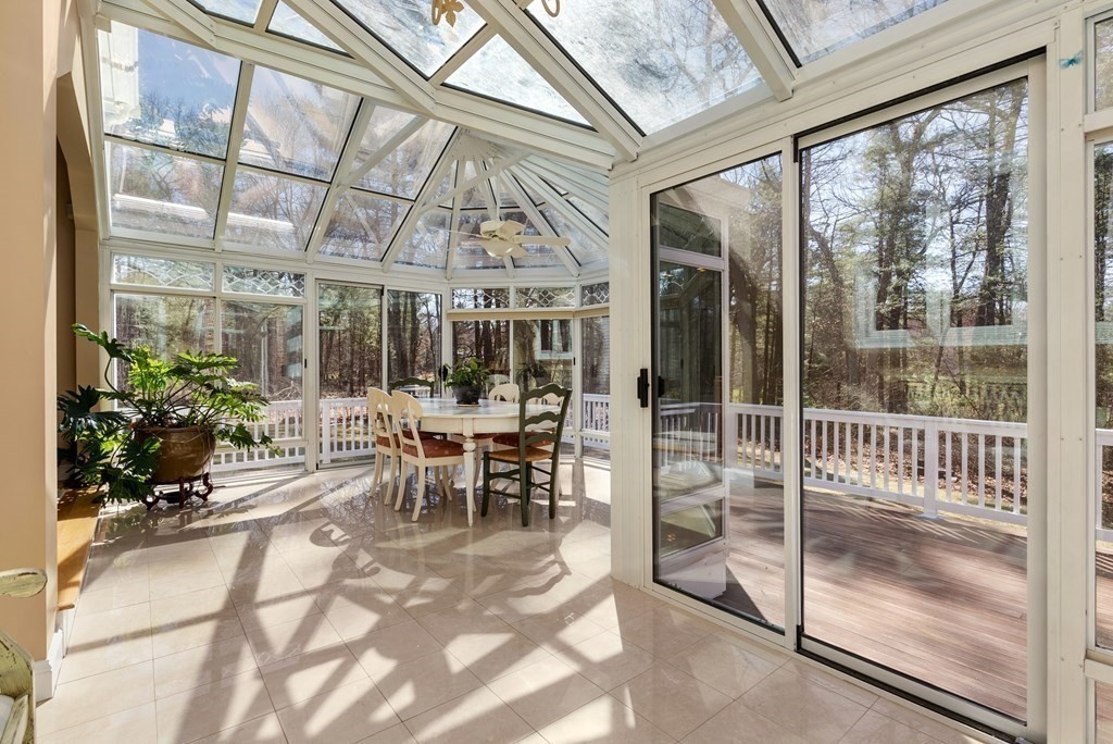 28 Cutler Farm Road Sudbury, MA 01776 - Photo 14 of 42 a view of a dining room with furniture window and outside view