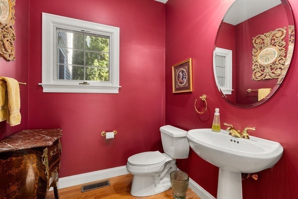 28 Cutler Farm Road Sudbury, MA 01776 - Photo 18 of 42 a bathroom with a sink mirror and toilet