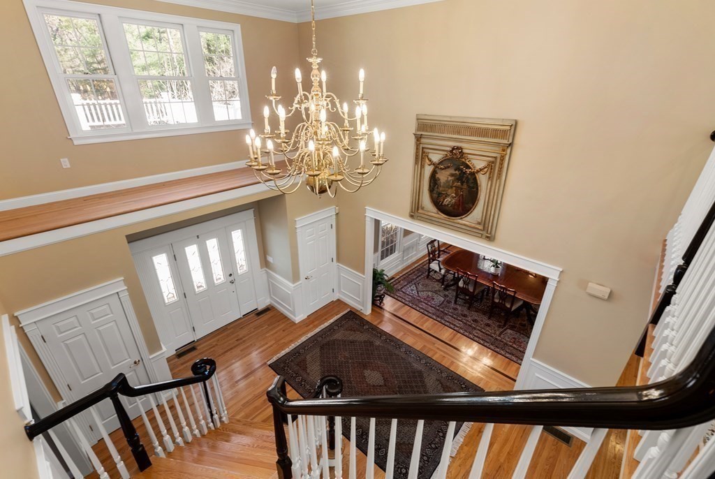 28 Cutler Farm Road Sudbury, MA 01776 - Photo 19 of 42 a view of an entryway and wooden floor
