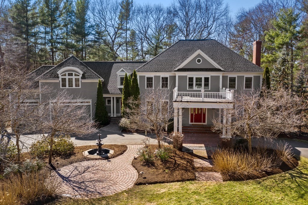 28 Cutler Farm Road Sudbury, MA 01776 - Photo 2 of 42 a front view of a house with a yard