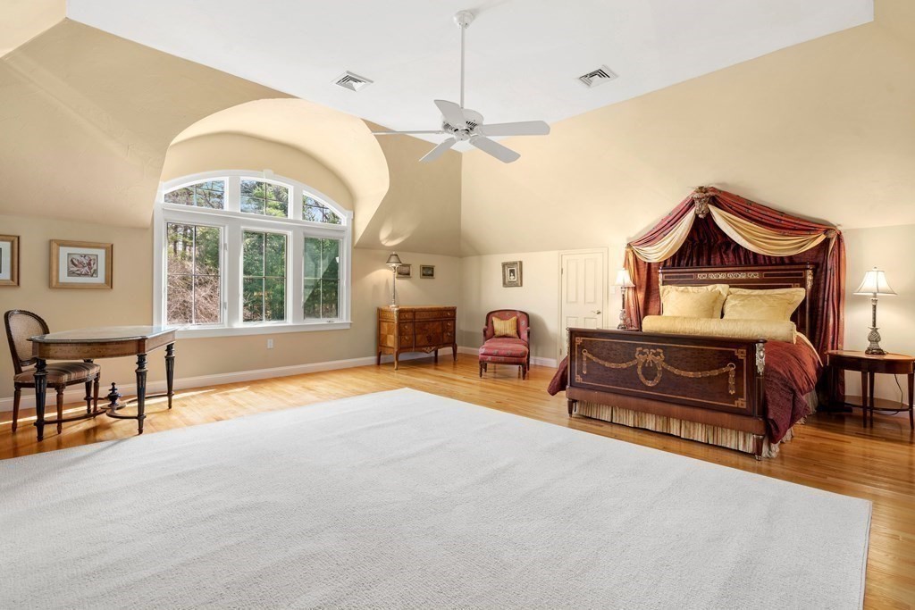 28 Cutler Farm Road Sudbury, MA 01776 - Photo 23 of 42 a bedroom with furniture and a large window