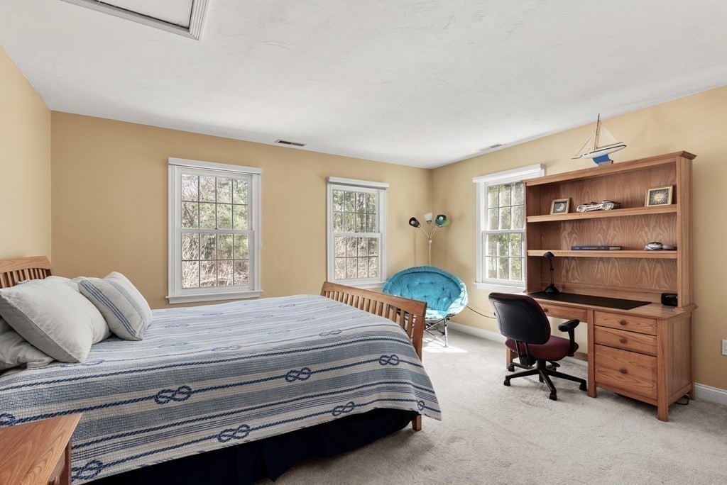28 Cutler Farm Road Sudbury, MA 01776 - Photo 27 of 42 a bedroom with a bed and a desk