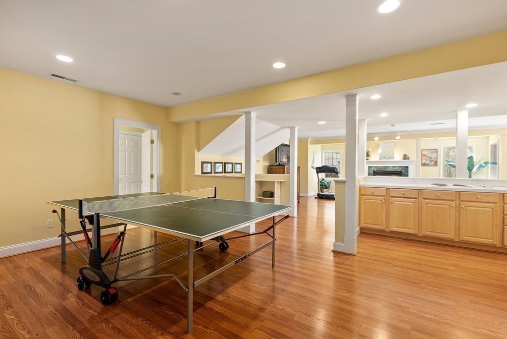 28 Cutler Farm Road Sudbury, MA 01776 - Photo 33 of 42 a kitchen with a table and chairs in it
