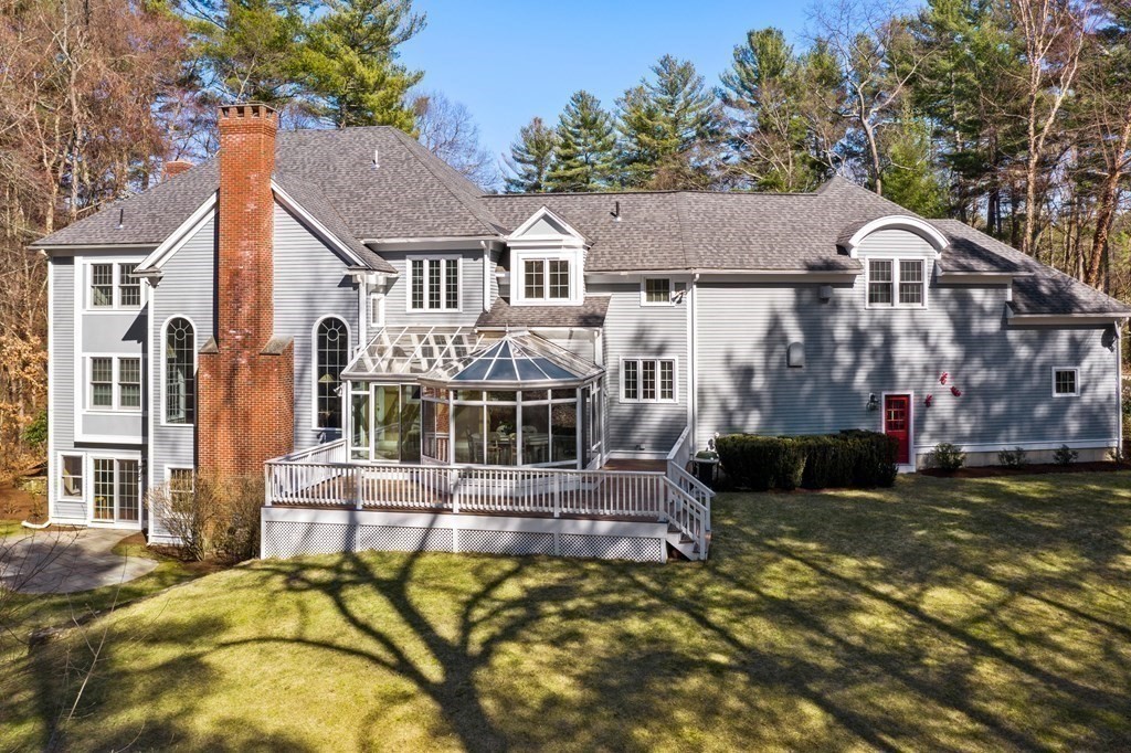 28 Cutler Farm Road Sudbury, MA 01776 - Photo 38 of 42 front view of a house with a yard