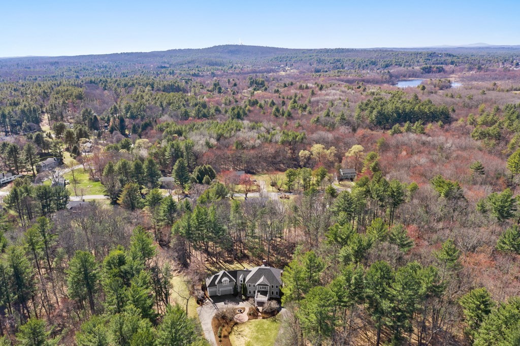 28 Cutler Farm Road Sudbury, MA 01776 - Photo 42 of 42 an aerial view of mountain and trees around