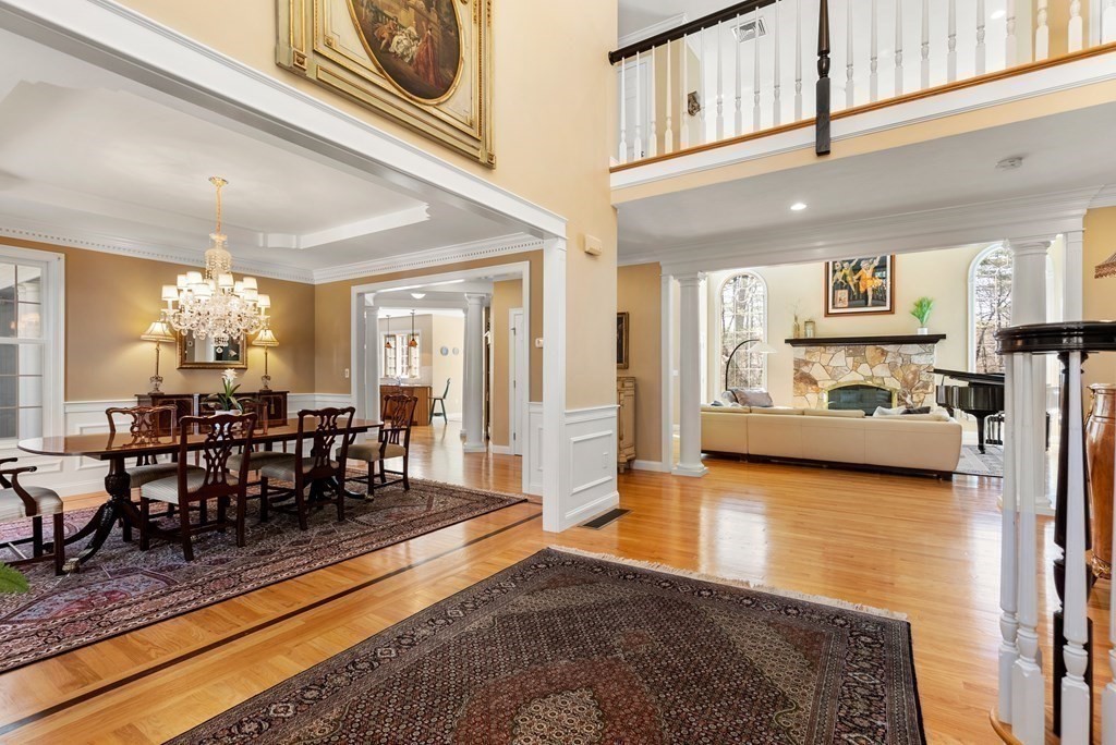 28 Cutler Farm Road Sudbury, MA 01776 - Photo 5 of 42 a view of a dining room with furniture window and wooden floor