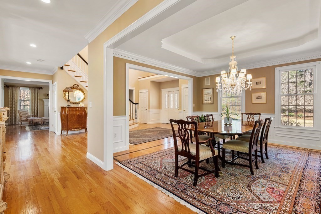 28 Cutler Farm Road Sudbury, MA 01776 - Photo 6 of 42 a view of a dining room with furniture and wooden floor