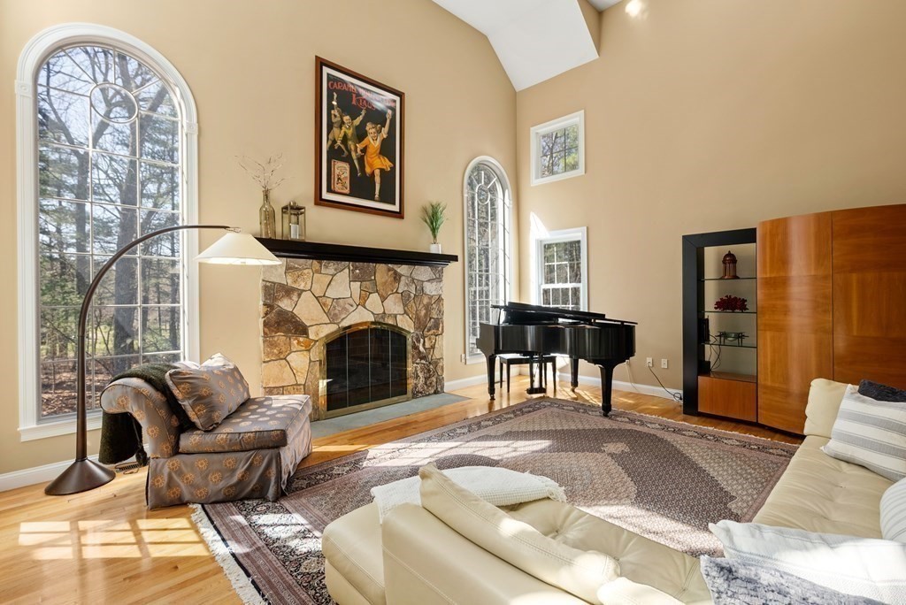 28 Cutler Farm Road Sudbury, MA 01776 - Photo 8 of 42 a living room with furniture and a fireplace