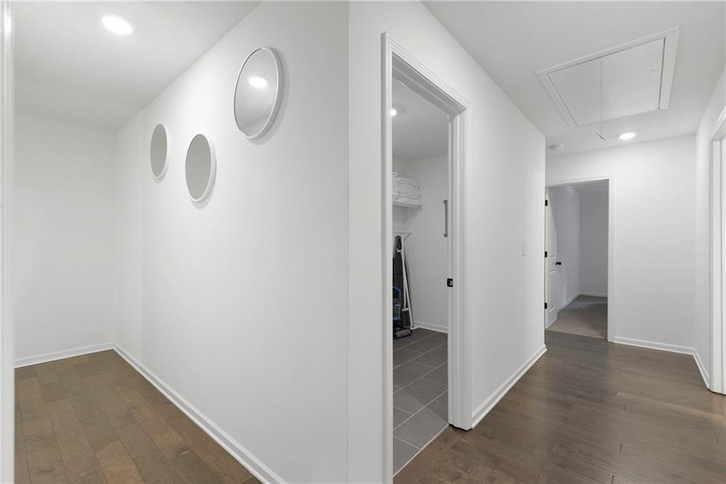 973 Mayson Turner Road Northwest Atlanta, GA 30314 - Photo 26 of 38 a view of a room with wooden floor and mirror