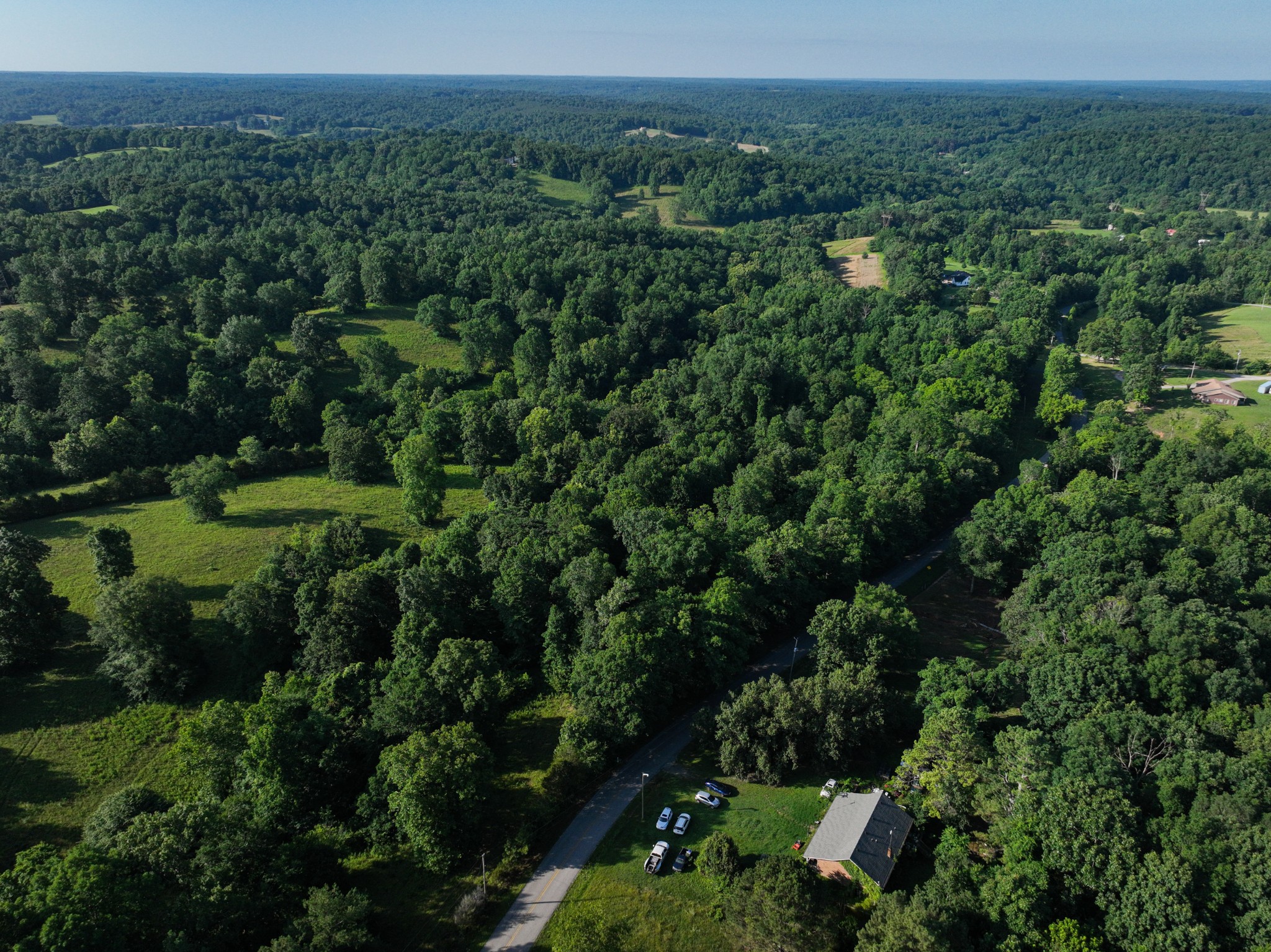 8 Shiloh Canaan Road Palmyra, TN 37142 - Photo 2 of 8 an aerial view of a house with a yard