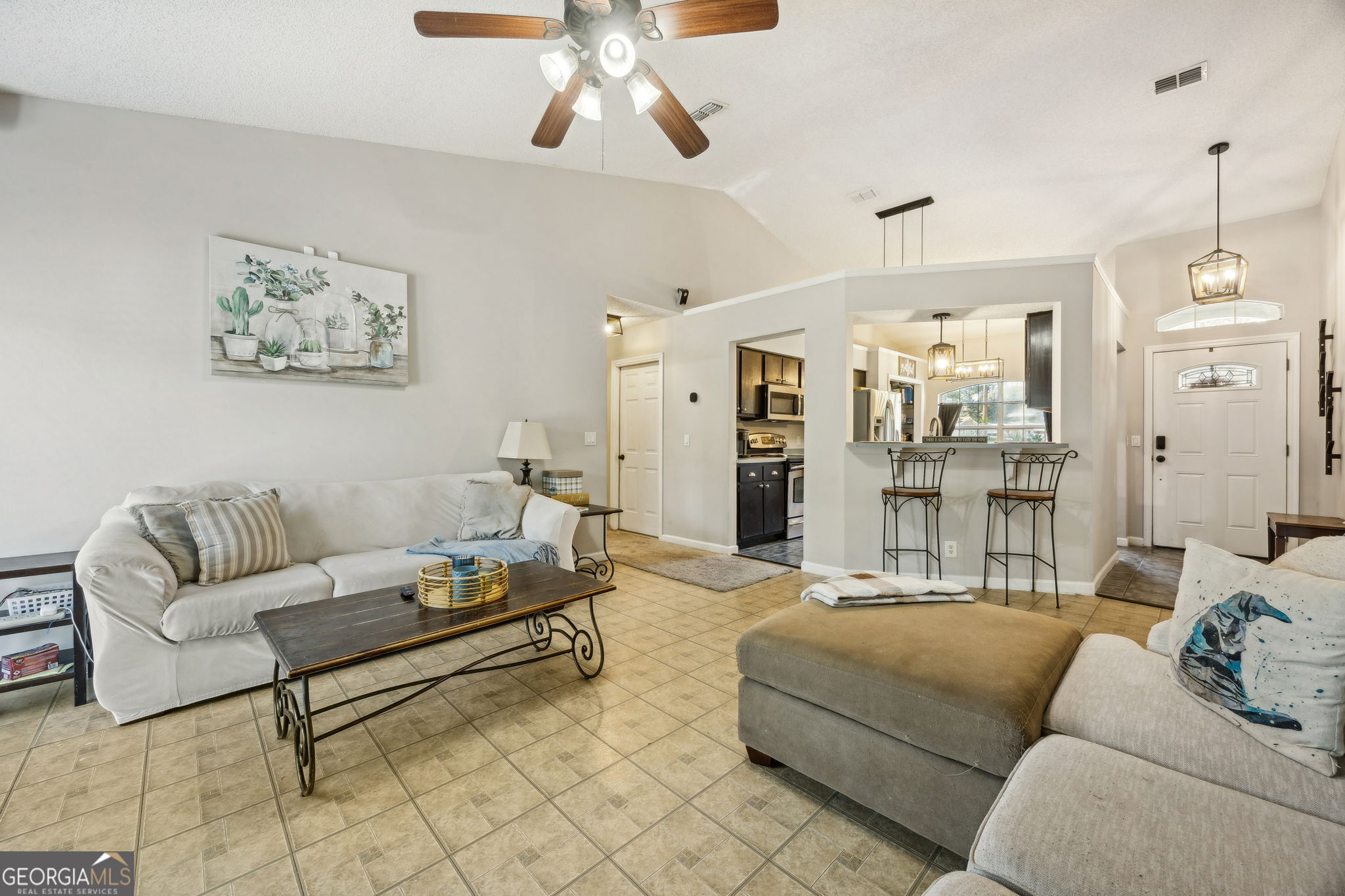 1720 Point Peter Road St. Marys, GA 31558 - Photo 17 of 93 a living room with furniture and a chandelier