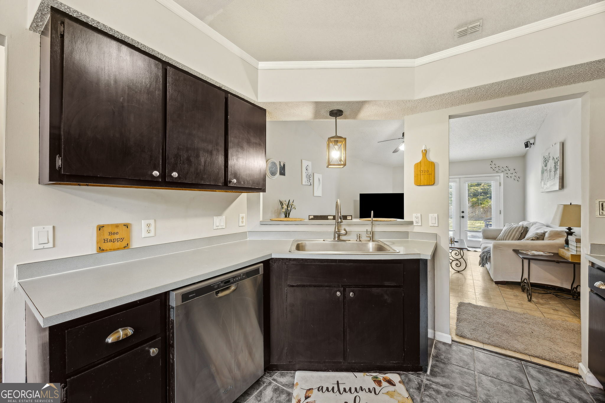 1720 Point Peter Road St. Marys, GA 31558 - Photo 22 of 93 a kitchen with a sink and cabinets