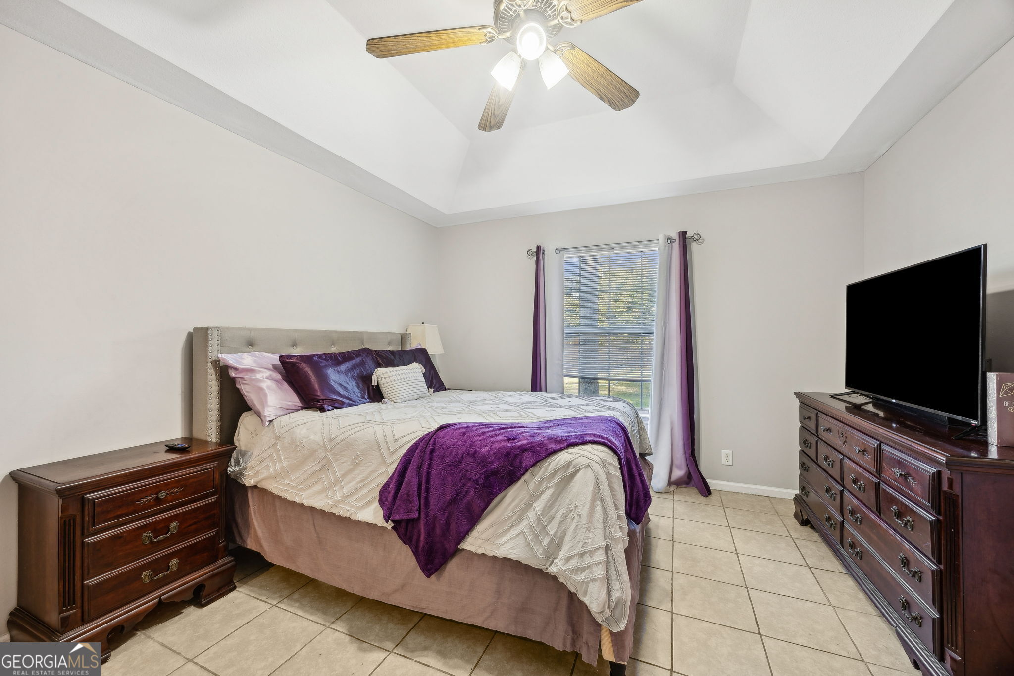 1720 Point Peter Road St. Marys, GA 31558 - Photo 27 of 93 a bedroom with bed and a flat screen tv