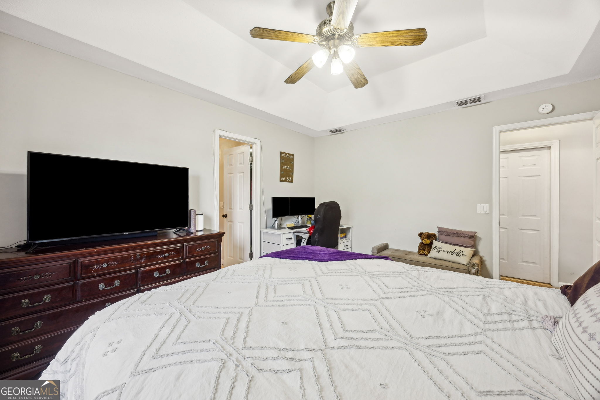 1720 Point Peter Road St. Marys, GA 31558 - Photo 29 of 93 a bedroom with a bed and a flat screen tv