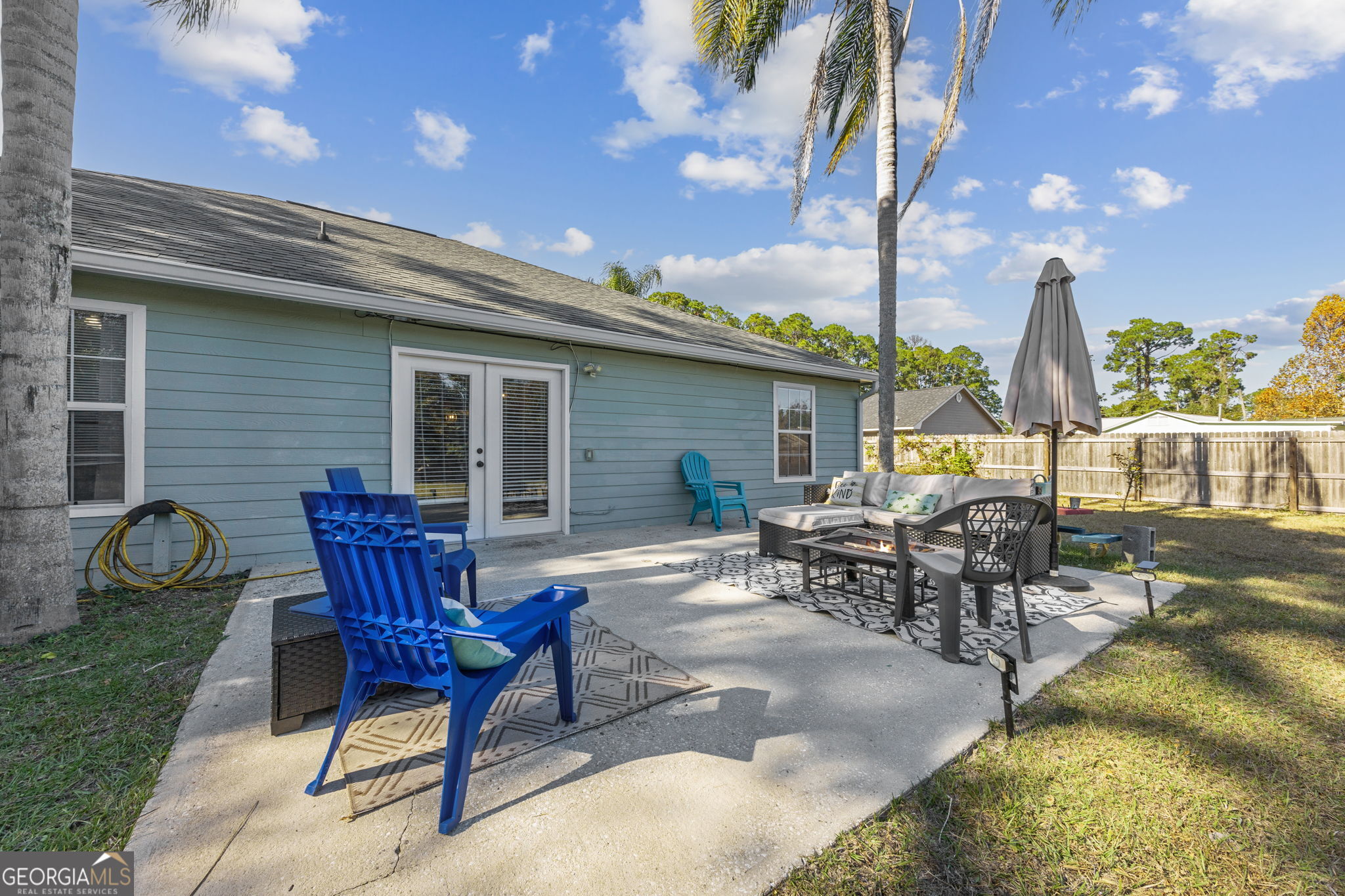 1720 Point Peter Road St. Marys, GA 31558 - Photo 42 of 93 a view of a patio with table and chairs and potted plants