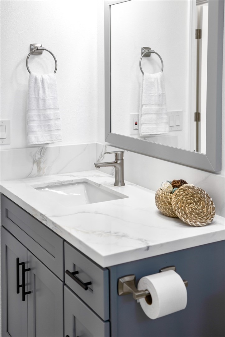 9210 Ralph Street Rosemead, CA 91770 - Photo 12 of 59 a bathroom with a sink and a mirror