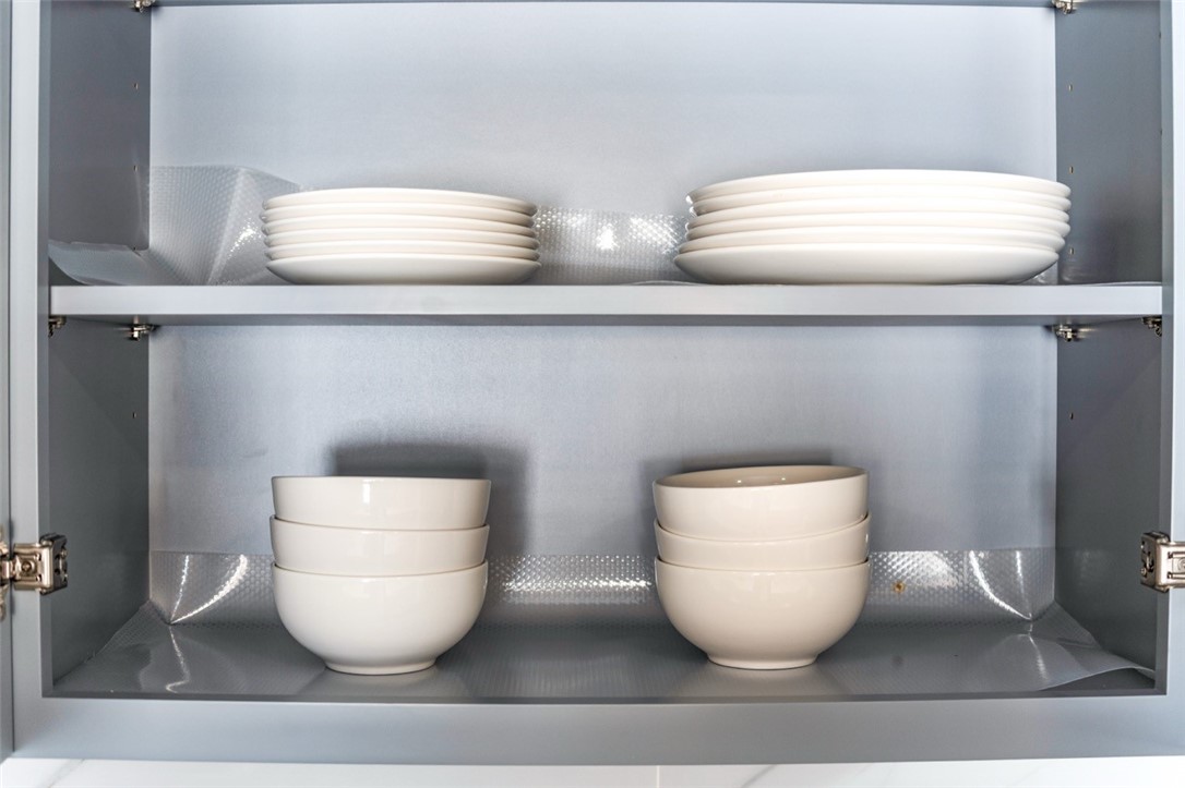 9210 Ralph Street Rosemead, CA 91770 - Photo 15 of 59 a white vase sitting on top of a shelf