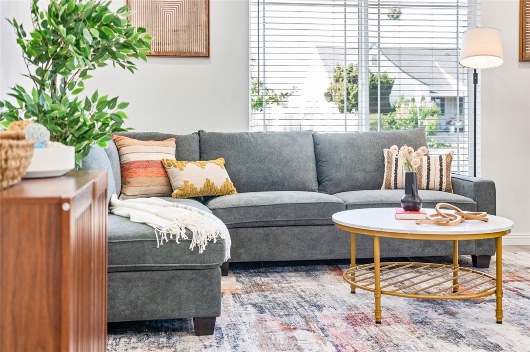 9210 Ralph Street Rosemead, CA 91770 - Photo 16 of 59 a living room with furniture and a potted plant