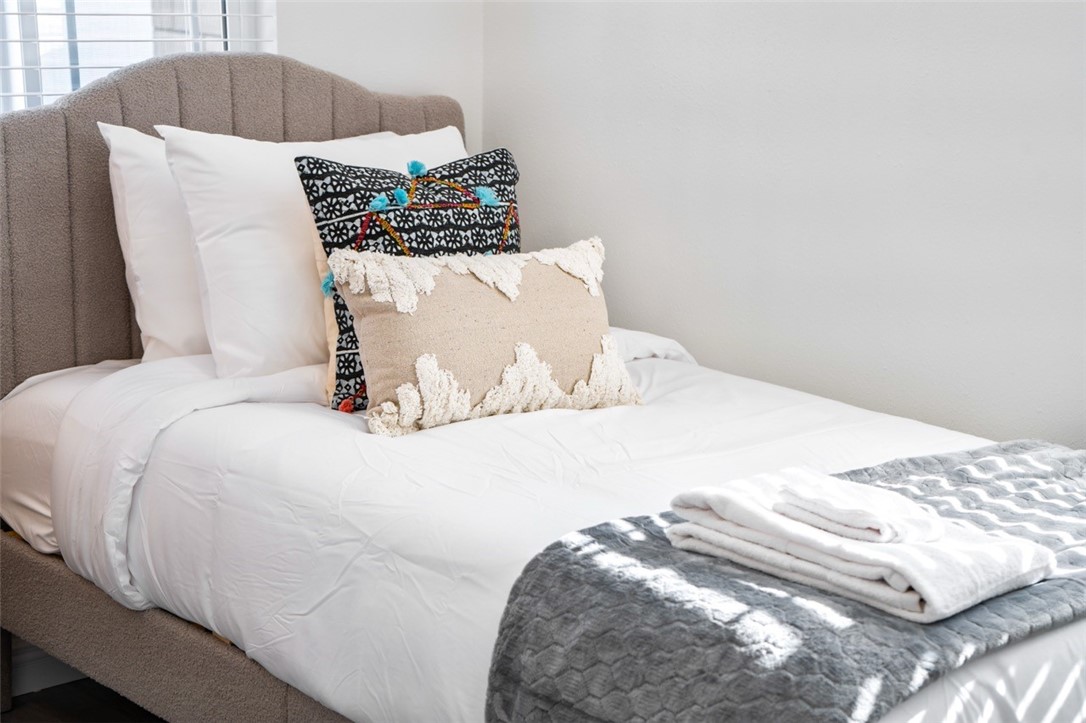 9210 Ralph Street Rosemead, CA 91770 - Photo 17 of 59 a bedroom with a bed and a couch