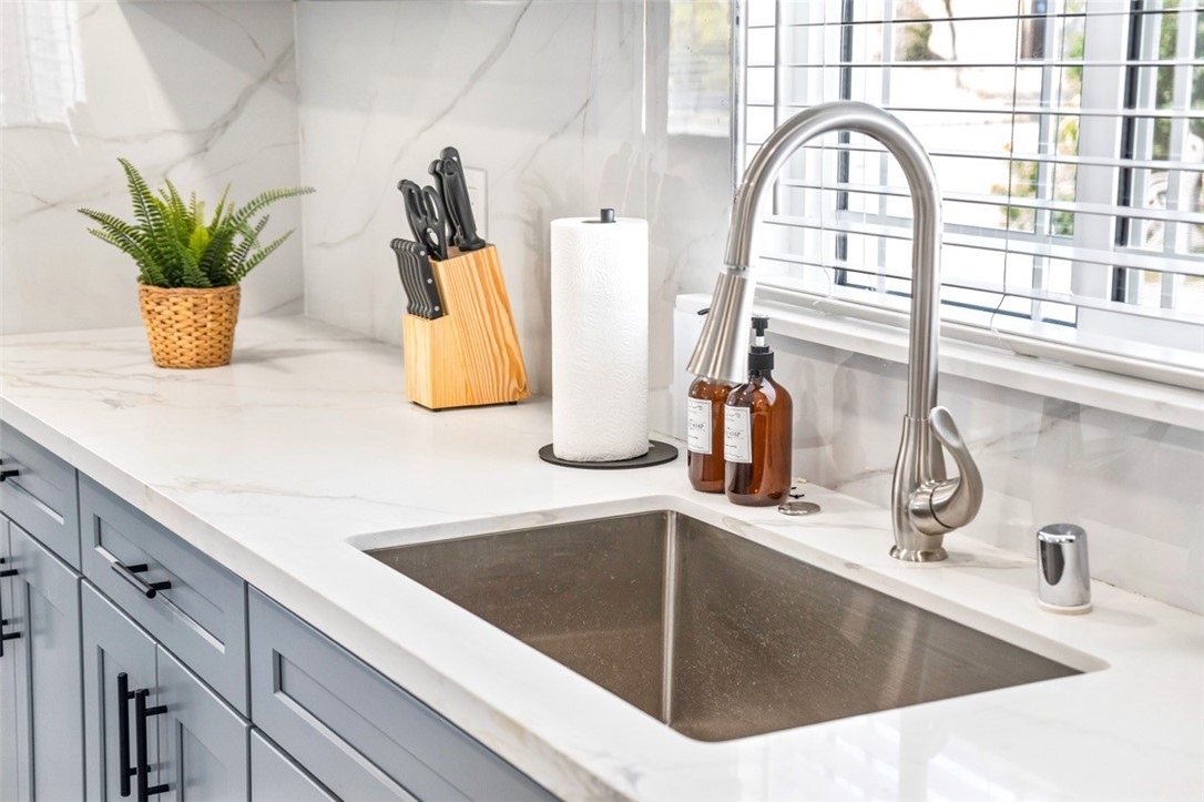 9210 Ralph Street Rosemead, CA 91770 - Photo 21 of 59 a kitchen with a sink and a potted plant