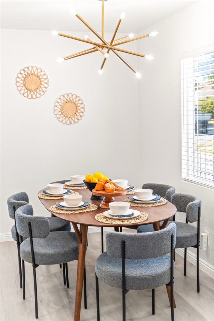 9210 Ralph Street Rosemead, CA 91770 - Photo 24 of 59 a dining room with furniture and window
