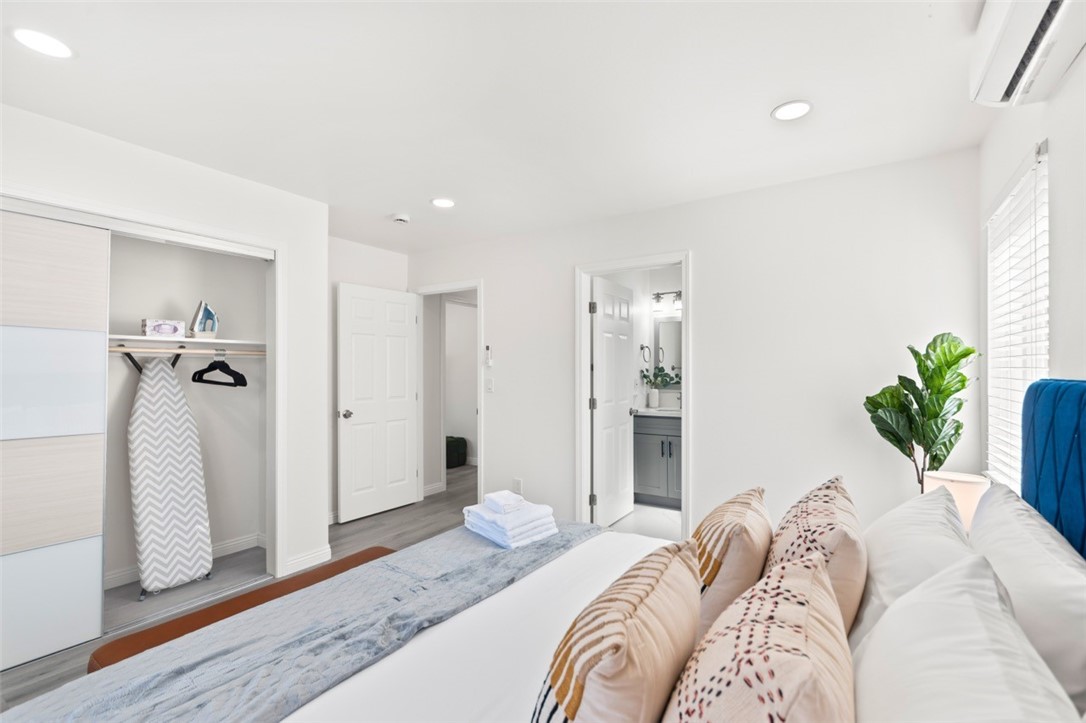 9210 Ralph Street Rosemead, CA 91770 - Photo 30 of 59 a bedroom with a bed and a potted plant