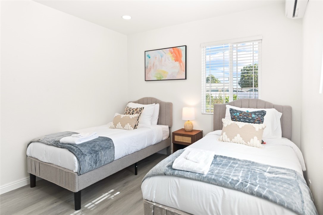9210 Ralph Street Rosemead, CA 91770 - Photo 36 of 59 a bedroom with two beds and a large window