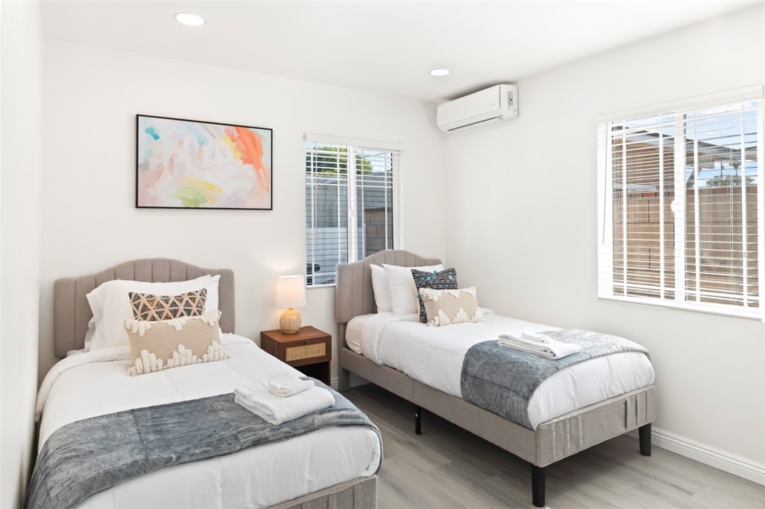 9210 Ralph Street Rosemead, CA 91770 - Photo 37 of 59 a bedroom with two beds and a large window