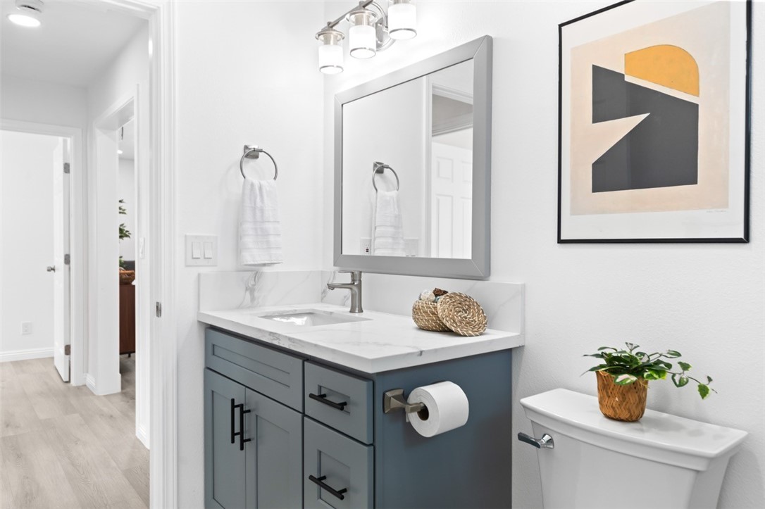 9210 Ralph Street Rosemead, CA 91770 - Photo 39 of 59 a bathroom with a granite countertop sink and a mirror