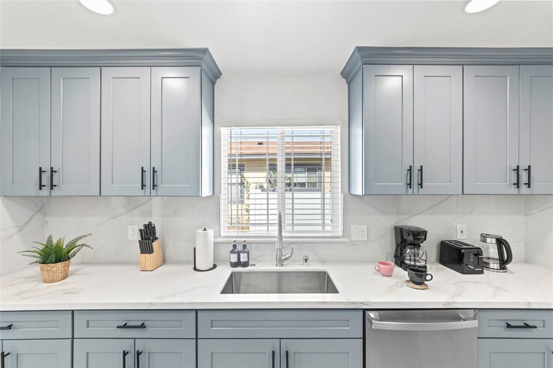9210 Ralph Street Rosemead, CA 91770 - Photo 44 of 59 a kitchen with a sink cabinets and window