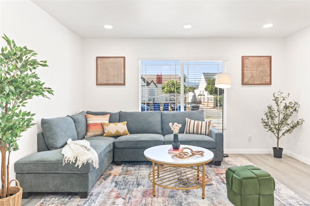 9210 Ralph Street Rosemead, CA 91770 - Photo 50 of 59 a living room with furniture and a table