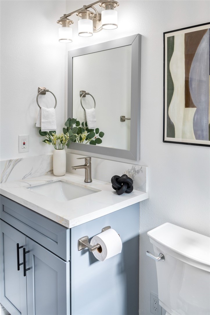 9210 Ralph Street Rosemead, CA 91770 - Photo 5 of 59 a bathroom with a sink and a mirror