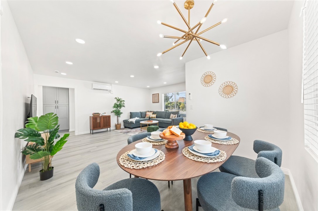 9210 Ralph Street Rosemead, CA 91770 - Photo 53 of 59 a dining room with furniture and wooden floor