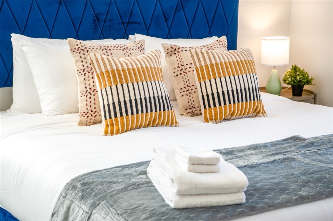 9210 Ralph Street Rosemead, CA 91770 - Photo 10 of 59 a bedroom with a bed and a couch