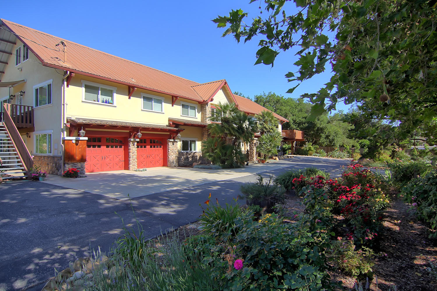 a front view of a building with garden