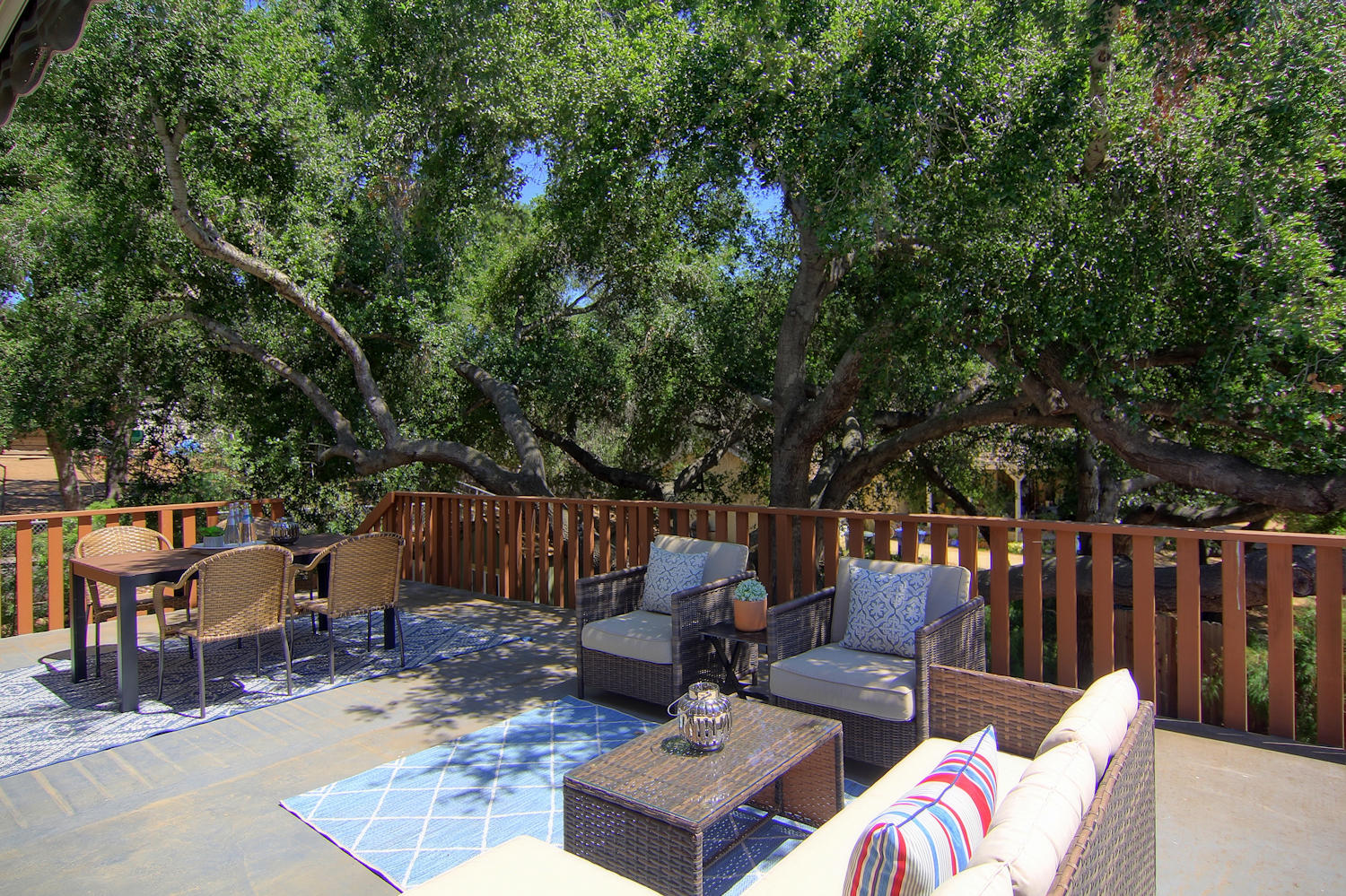 1442 South Rice Road Ojai, CA 93023 - Photo 18 of 50 a view of a patio with couches chairs and a fire pit